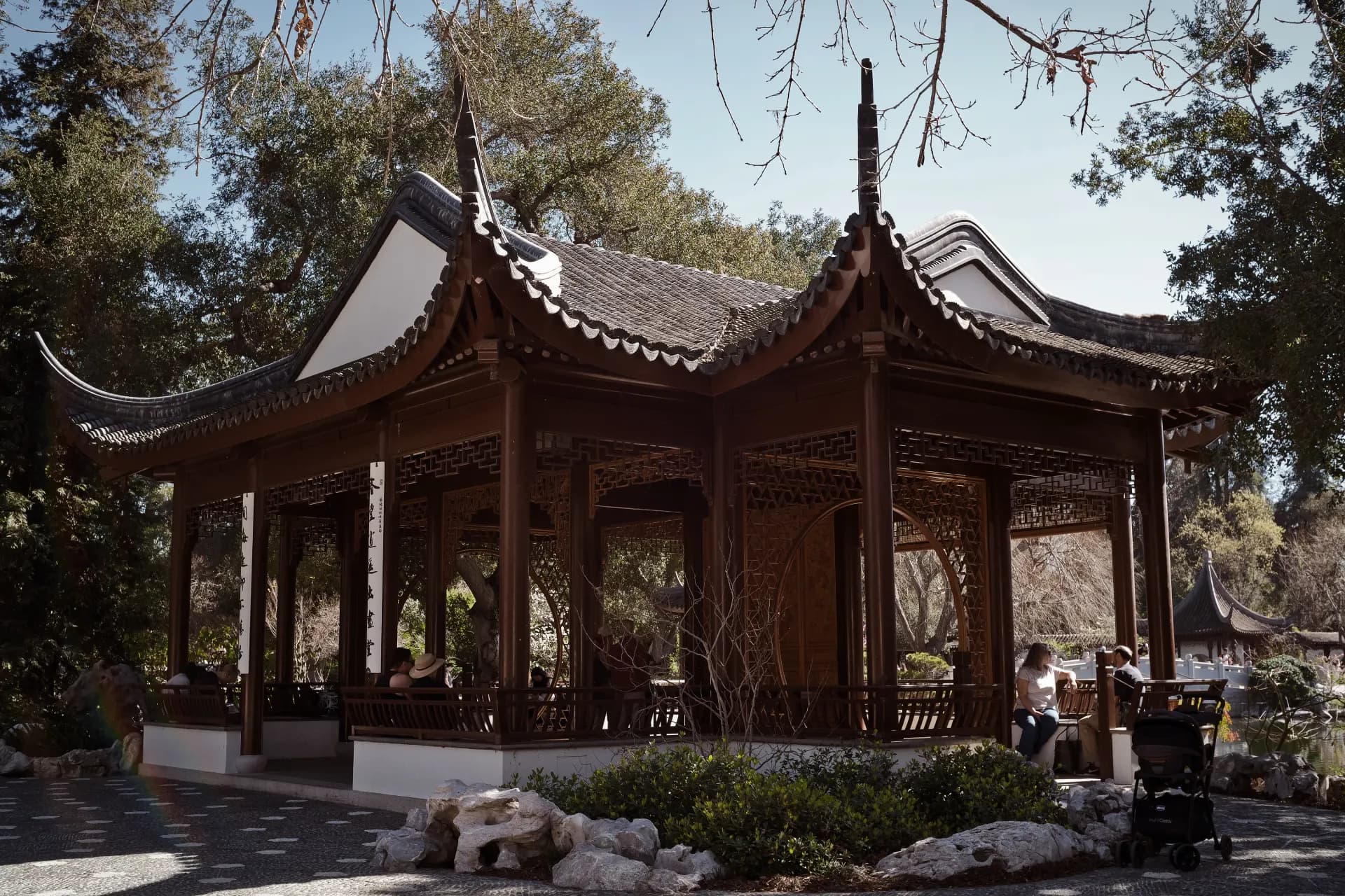 Traditional chinese pavilion with ornate wooden details.