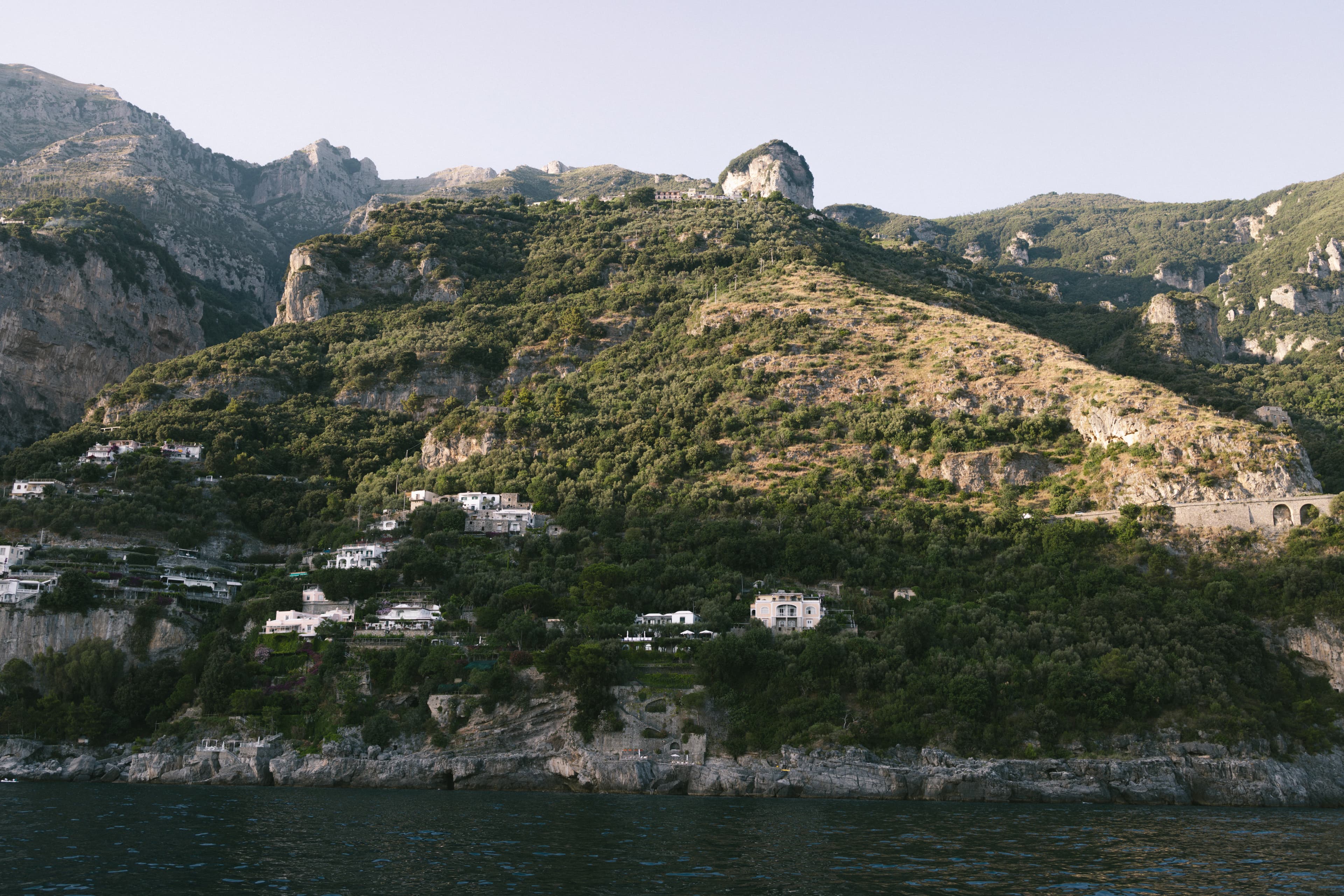 A mountain with a village on top of it